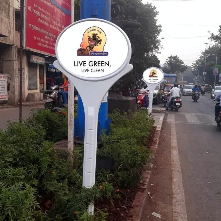 FRP lollipop signage boards carrying a Live Green Live Clean municipal campaign